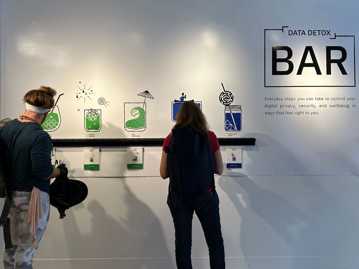 Visitors interacting with the Data Detox Bar installation